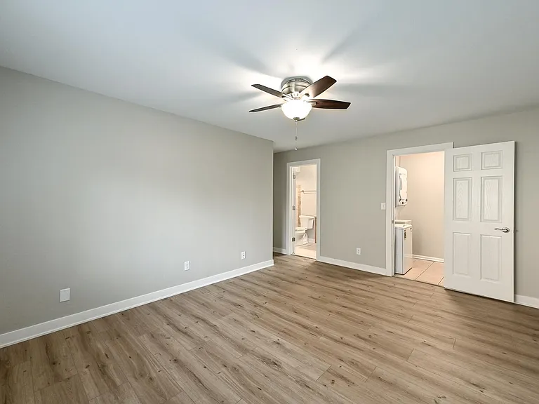 Primary Suite with Bathroom and Laundry Room