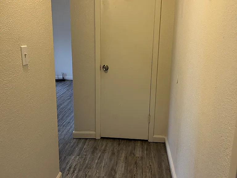 Hallway with linen closet