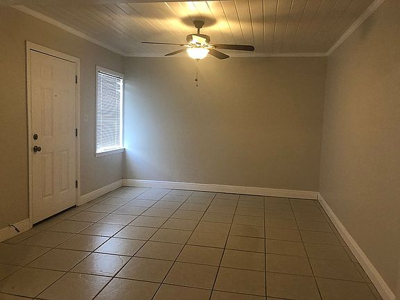 Tile floors and wood ceiling