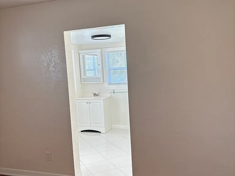 Master bedroom into bath