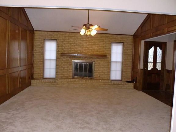 spacious den w/fp