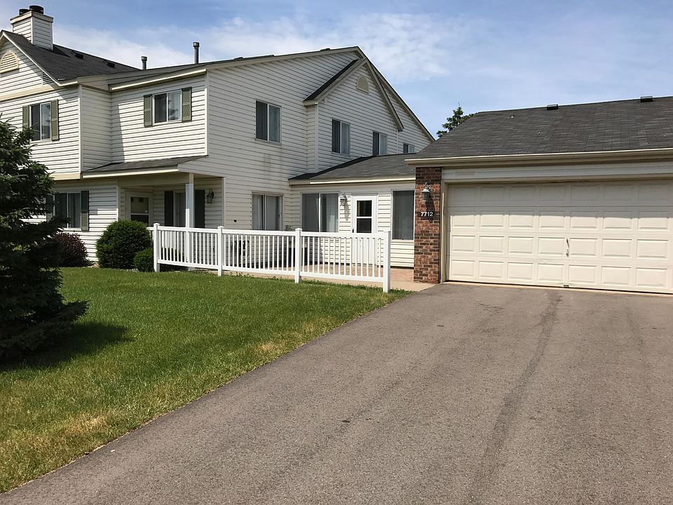 Front with patio and 2 car garage 