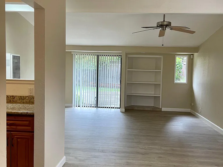 Walking into the living room from bedroom