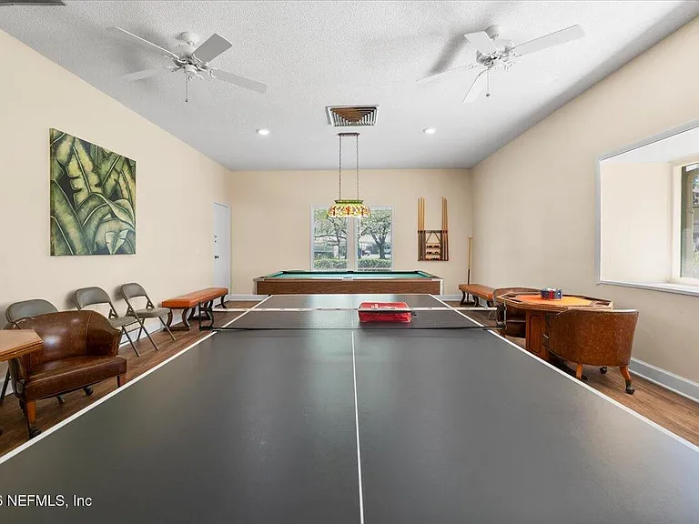 8140 Sutton Pl E — Photo 29