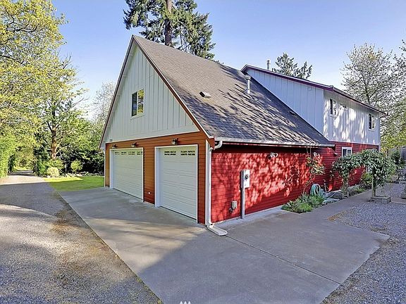 Side with 3 car garage