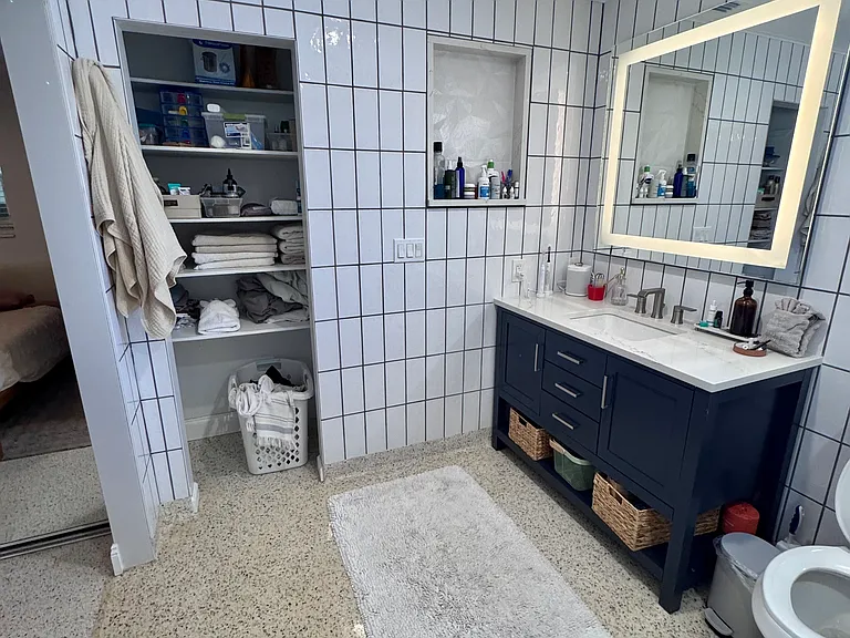 Primary bathroom linen closet