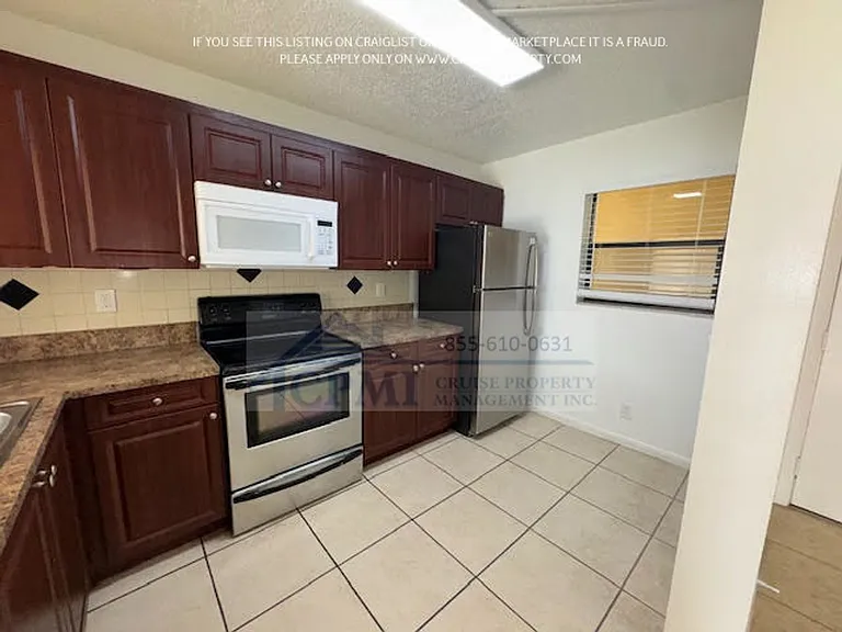 Island Club - 9000 NW 28th Dr Coral Springs, FL 33065 — Photo 15