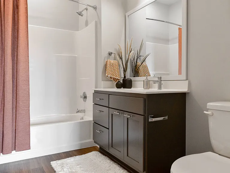 Modern bathroom retreat at The Hallon luxury apartments in Hopkins, MN