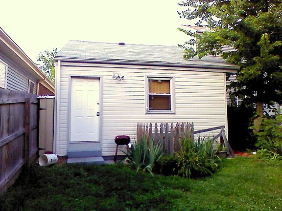 Back Door & Fenced A/C unit