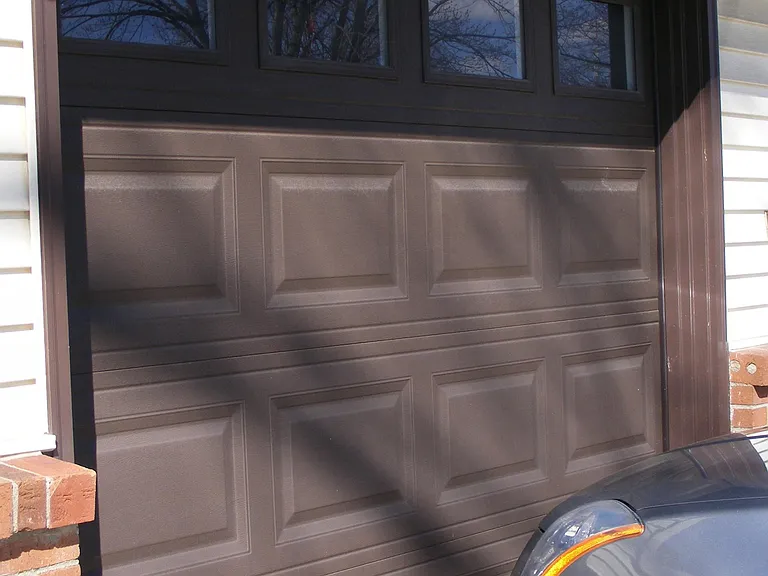 Attached garage door with remote control