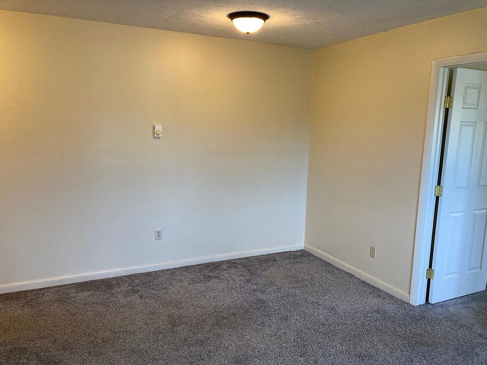 living/dining area view from kitchen. Door leads to the bedroom