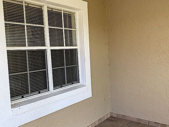 Inside screened front porch