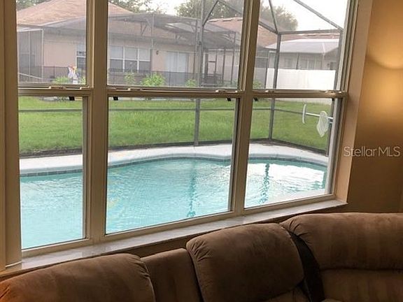 Large window and slider in family room allow you to enjoy a great view or be part of the party.