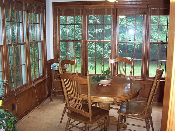Bright Breakfast nook surrounded by windows