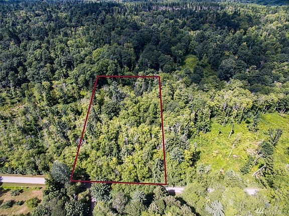 5th image of 9234 NE Country Woods Ln Lot 12