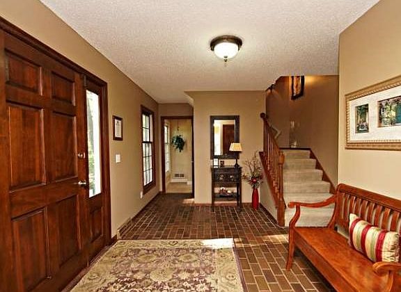 There is more than enough room to greet family and friends in the large front entry.