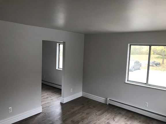 Entire apartment has fresh paint, new moldings and flooring.