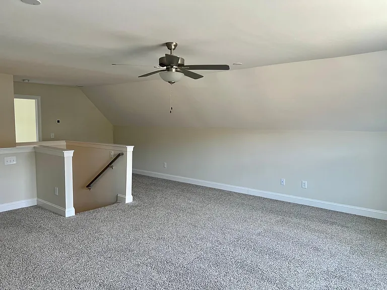 Large bonus room upstairs with 3rd bedroom and full bath.