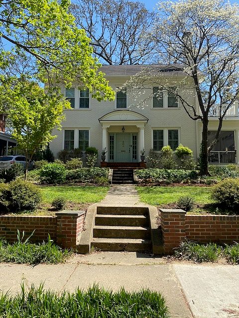 Beautiful painted brick and new mulch in front.