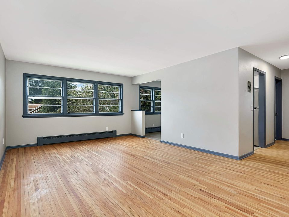 The available unit has carpet instead of hardwood floors.
