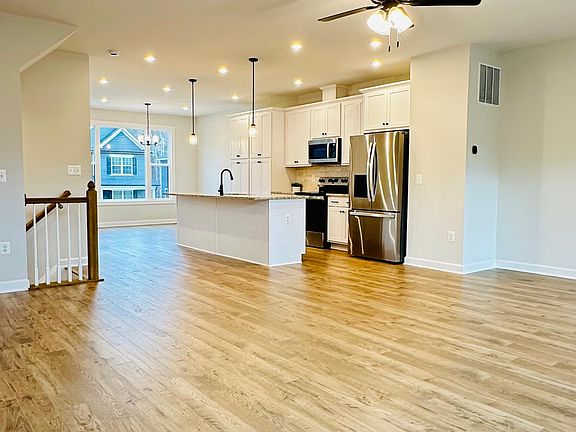 One level up from the entry, the great room spans the entire 2nd floor.