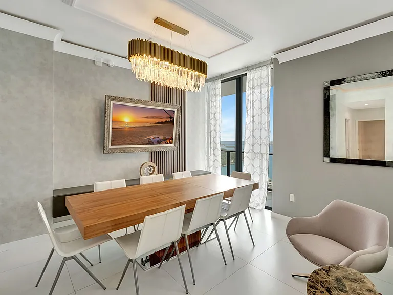 Dining Area / Enjoy Unobstructed water views and access to the Balcony from every room.