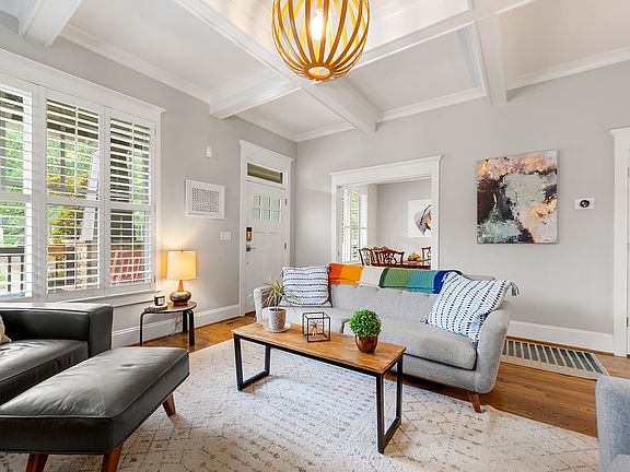 Living room showing dining room/main floor bedroom.