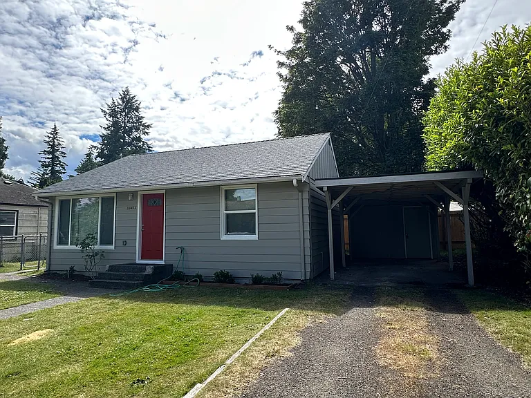 Welcome home! 1-level home with carport and additional storage room.