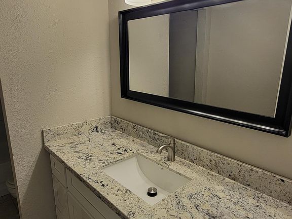 Large Vanity in Both Full Bathrooms
