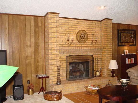 Large Fireplace is centerpiece of living area
