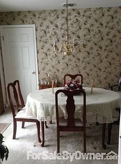dining room : The dining room, just off the kitchen, can be closed off with a "pocket door".