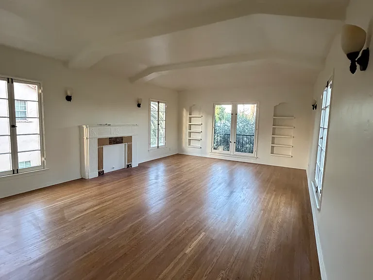 Spacious living room with high ceiling