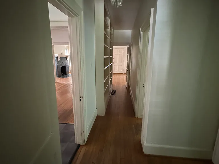 hallway outside of bathroom looking towards living room