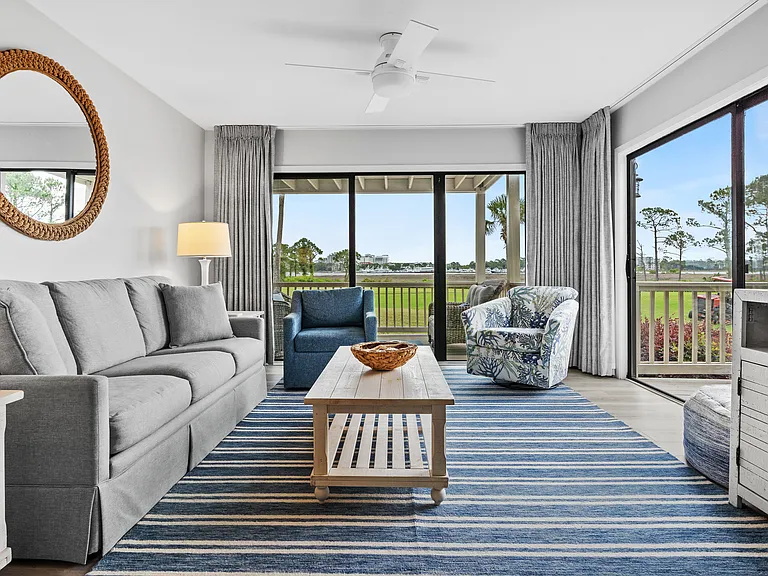 Bright living area with access to decks