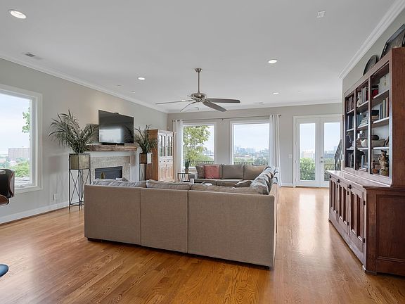 Expansive living room fireplace and tremendous views of the city