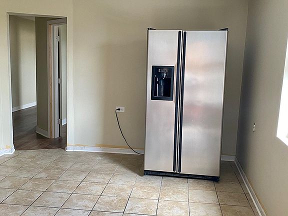 Large kitchen with eat in area.