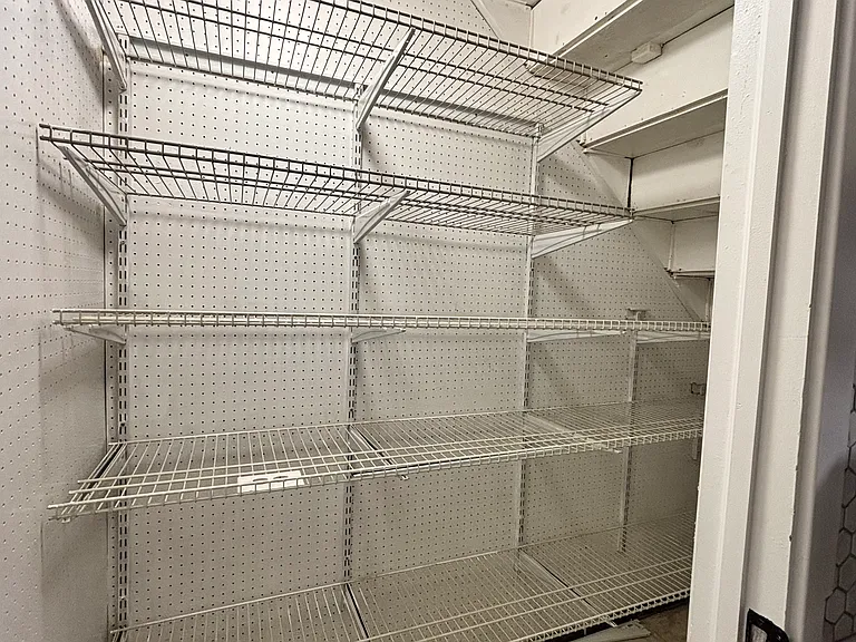 Very large pantry space in kitchen, under the stairs