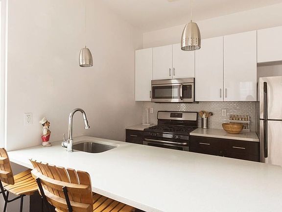 3rd image of 128 Scholes St APT 3A