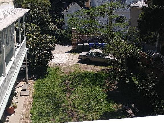 Apartment(on left) overlooks rear garden and has off street parking to the rear off Wasbee Range (alley in back)