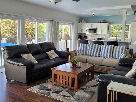 82 inch TV and 3 Full length sofas perfect for movie night