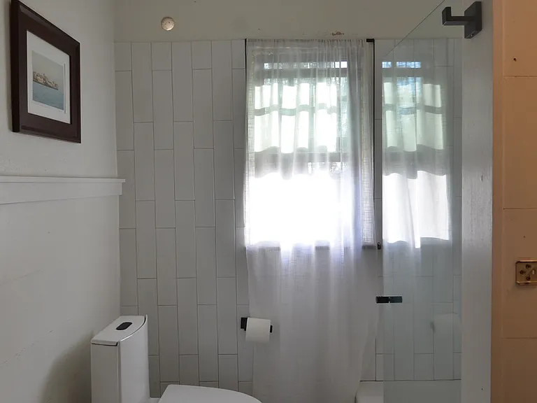 Cute and light upstairs bathroom.