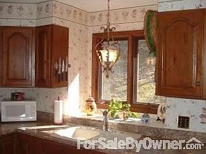 Remodeled Kitchen
						:
						New countertops, cabinetry fixtures, lighting, faucets, & dishwasher...beautiful