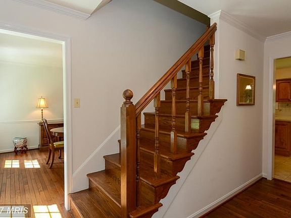 Welcoming entry foyer with wood floors