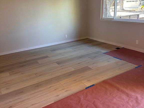 Living Room / new floor covered to protect