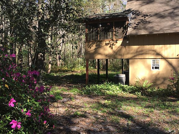 Enclosed Screened Porch off of the second story kitchen. Great views of wildlife!