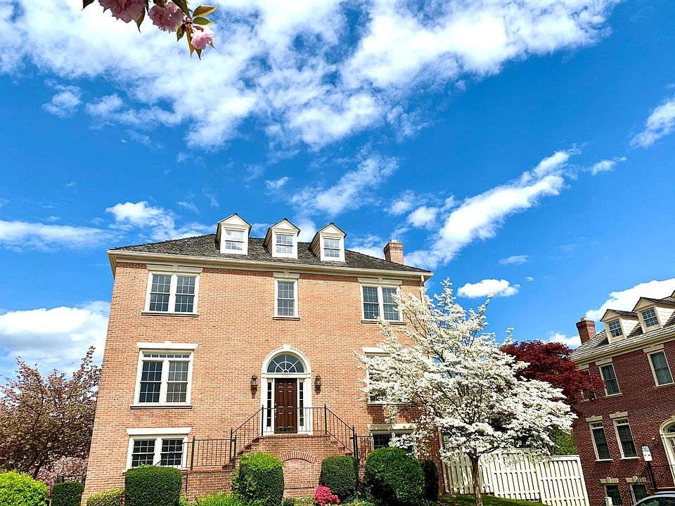 Front of the home presents like a Single Family House. 

And yes, tree is legit this beautiful in the spring! No photo editing here!