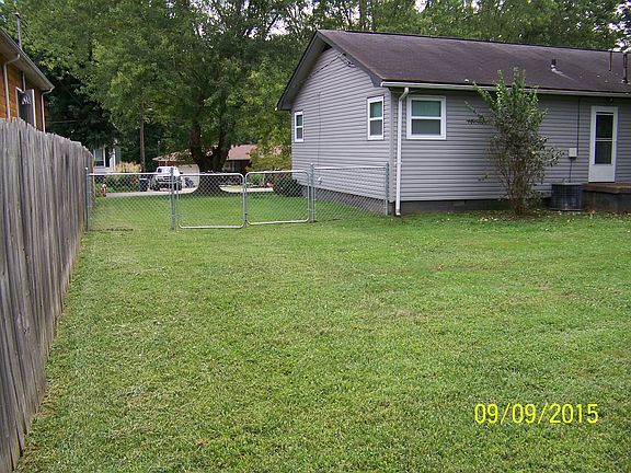 back yard has gate for vehicle access