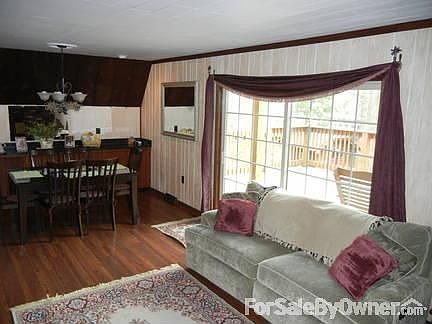 Living room/dining room
						:
						Living room and the dining room and sliding door that steps onto the main deck.