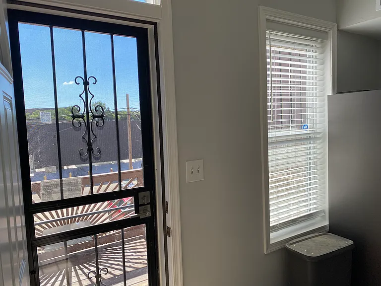 back door to private deck from kitchen
