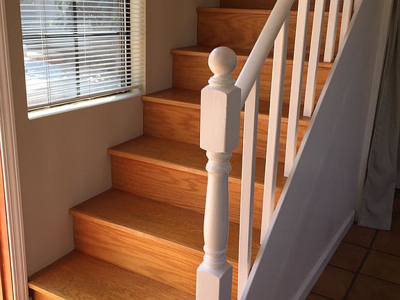 Staircase leading to loft bed